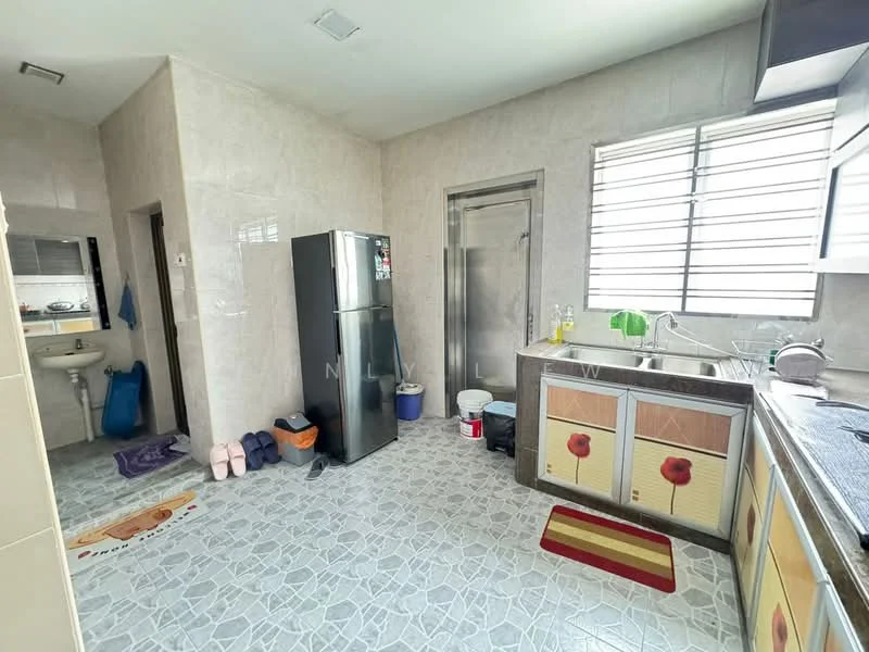 Kitchen features: grey tiled flooring, white painted walls, single-bowl stainless-steel sink, chrome pull-down faucet, kitchen countertop with cabinets, built-in refrigerator, window with horizontal bars, shower area with glass door, toilet with sink, area rug with floral pattern. Room features: toilet with sink, grey tiled flooring, white painted walls.