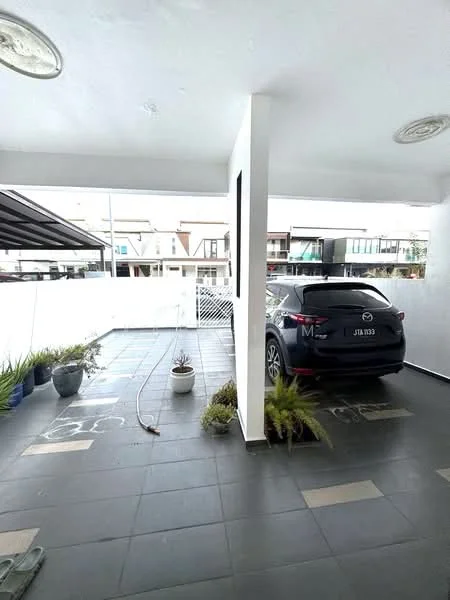 Exterior type: car porch; features: paved flooring, covered car porch, white painted walls, planters with greenery, outdoor lighting fixtures, fenced perimeter, open space layout, adjacent to residential buildings; style: modern.