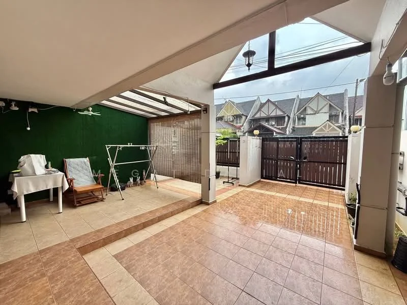 Room features: tiled flooring in beige and brown, green accent wall, covered patio area, clothes drying rack, outdoor lighting fixtures, wooden fence, sliding gate, outdoor seating area, overhead glass roof; style: modern; view: garden.