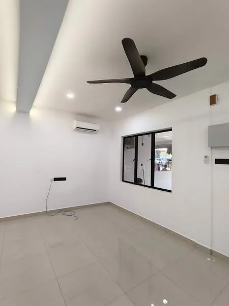Room features: white painted walls, grey ceiling with recessed lighting, 5-blade ceiling fan in black, wall-mounted split AC unit, large window with black frame, glossy ceramic tile flooring, power outlet on wall, cable management conduit on floor; style: modern.