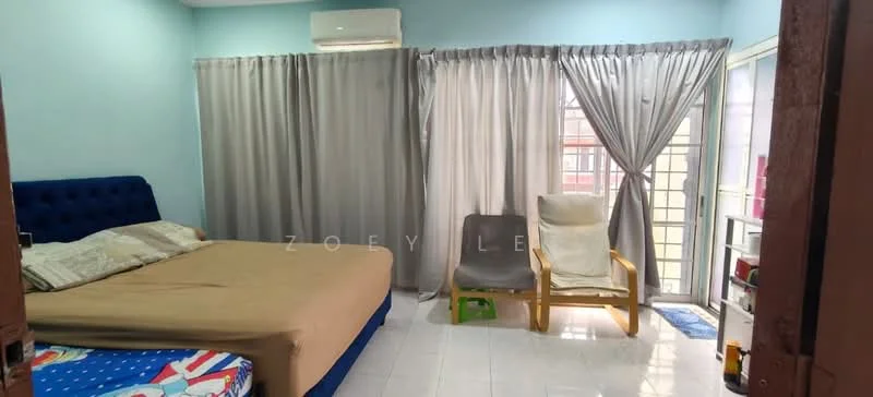 Bedroom features: king-size bed with beige bedding, blue upholstered headboard, 2-seater fabric sofa in grey, white curtains, floor-to-ceiling windows, air conditioning unit, white tiled flooring, light blue painted walls, wooden chair, small green stool, shelves with decorative items; style: modern.