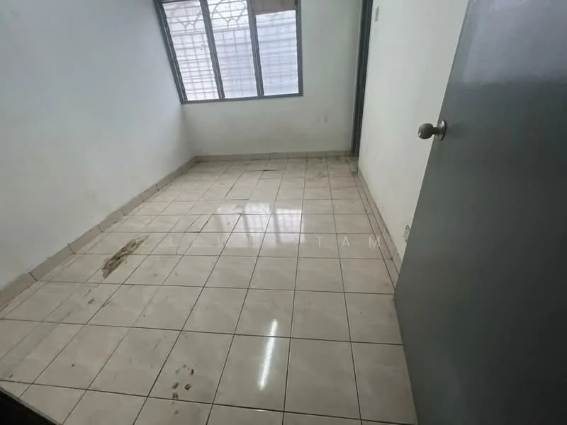 Room features: white painted walls, ceramic tile flooring, window with grid pattern, single door, fluorescent lighting.