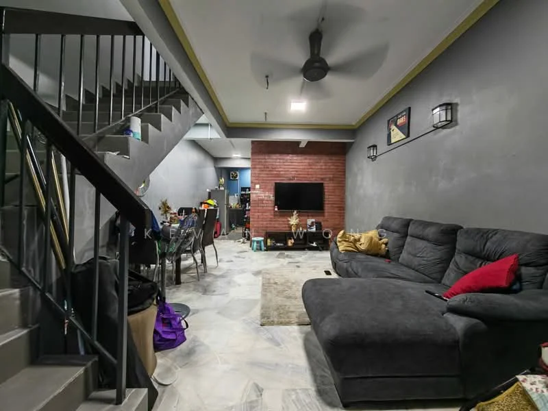 Living features: grey fabric sectional sofa, black accent pillows, area rug with neutral color, wall-mounted TV, exposed brick feature wall, grey painted walls, marble tile flooring, 5-blade ceiling fan with light, decorative wall sconces, dining table with chairs, staircase with black railing; style: modern.
