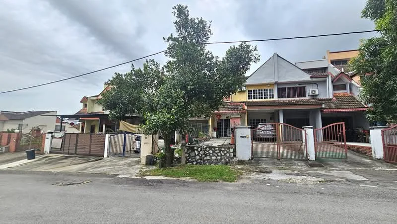 Exterior type: linked terrace house; features: two-storey building, red brick facade, gated entrance, driveway with interlocking pavers, manicured lawn, mature trees, front porch, visible car parking, surrounded by residential area, street view, grey tiled roof; style: modern.