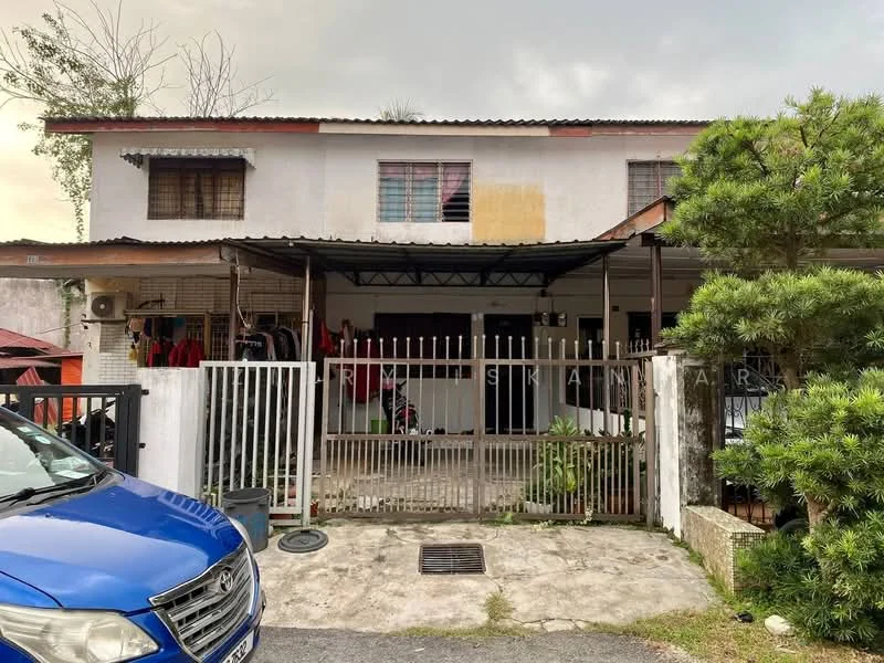 Exterior type: linked terrace house; features: two-storey building, white painted facade, metal roof, front porch with awning, fenced front yard, manicured shrubs, concrete driveway, visible parking area, multiple windows, security gate; style: modern.
