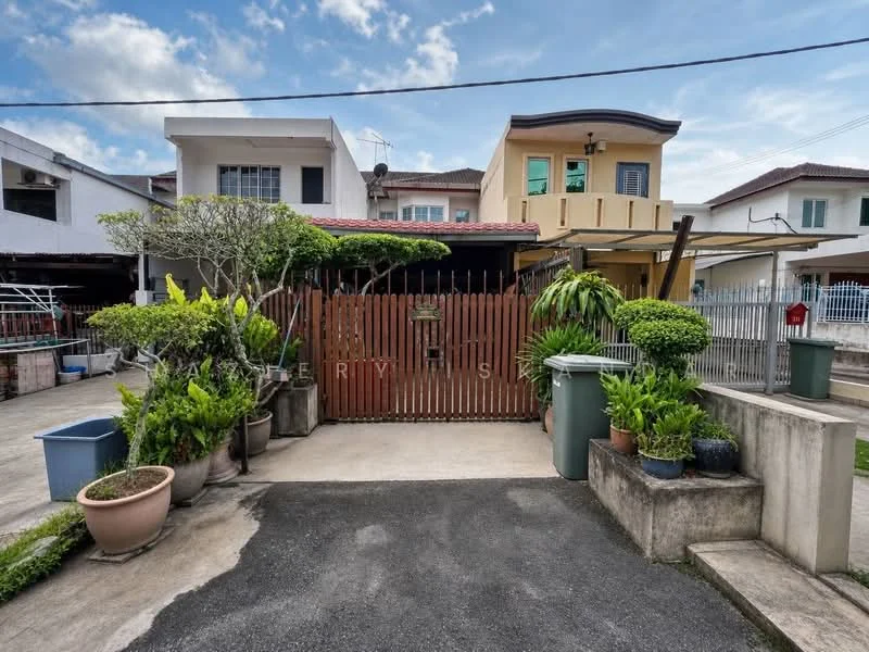 Exterior type: linked terrace house; features: wooden gate, paved driveway, manicured garden, potted plants, concrete wall, two-storey house, surrounding greenery, car porch, fenced perimeter, adjacent houses; style: modern.