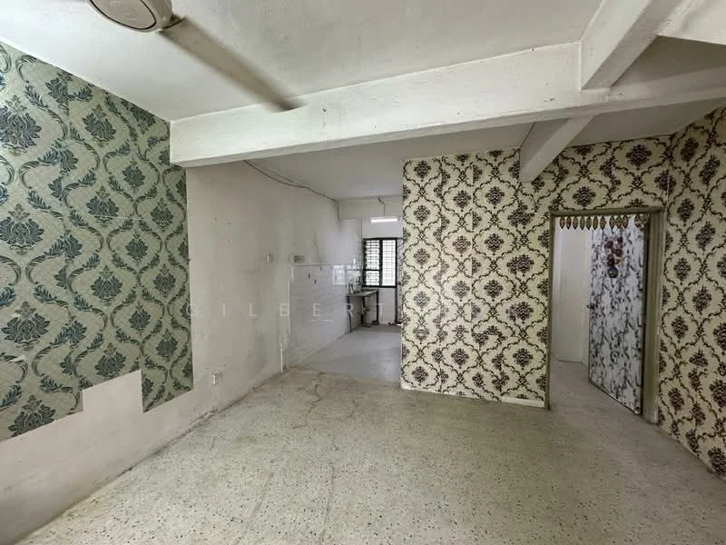 Room features: textured wallpaper with floral pattern, textured wallpaper with damask pattern, exposed beams on ceiling, concrete flooring, window with grille, white painted walls, open layout, no visible furniture; style: traditional.