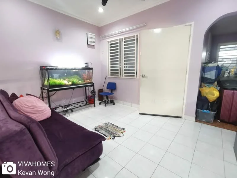 Living features: purple painted walls, white tiled flooring, sofa in dark purple, pink cushion on sofa, fish tank with aquatic plants, window with horizontal blinds, white door, blue chair, area rug with geometric pattern; style: modern.