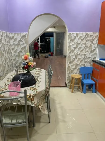 Dining features: dining table with floral tablecloth, metal dining chairs, decorative wall with textured panels, purple painted walls, tiled flooring, small blue chair, wooden stool, open archway leading to another room; style: modern. Room features: wooden flooring, large windows, visible living area beyond the archway.