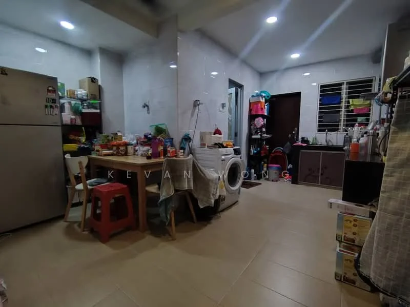 Kitchen features: stainless-steel fridge, wood dining table, red plastic chairs, washing machine, white tiled walls, beige tiled flooring, multiple kitchen cabinets, various kitchen appliances on counter, sink, open shelving, light fixtures, window with grill; style: modern.