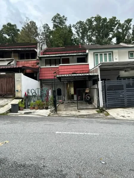 Exterior type: semi-detached house; features: red tiled roof, two-storey structure, white painted facade, gated entrance, front porch, manicured lawn, surrounded by greenery, driveway with interlocking pavers; style: modern.
