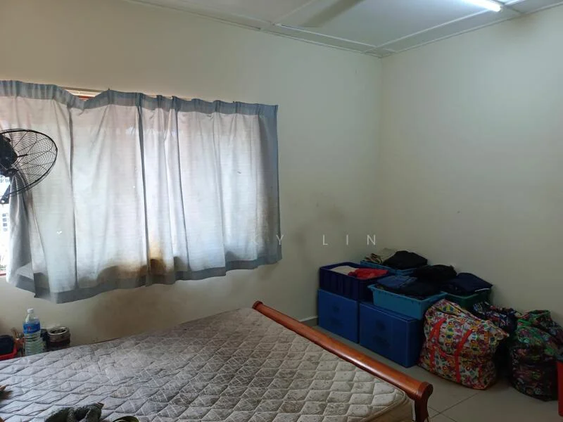 Bedroom features: single bed, light-colored walls, curtains, ceiling fan, mattress on bed frame, clothing storage bags, plastic storage boxes, window with natural light.