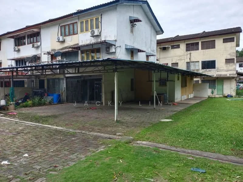 Exterior type: low-rise apartment block; features: covered car porch with awning, brick-paved driveway, manicured lawn, mature trees, multiple air conditioning units on facade, ground-level entrance, open outdoor space, surrounded by greenery; style: traditional.