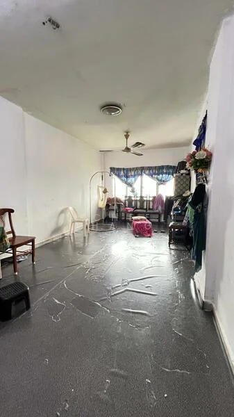 Room features: white painted walls, grey flooring, ceiling fan, curtains, large windows, clothes rack, plastic chair, wooden chair, storage shelves, luggage, step stool.