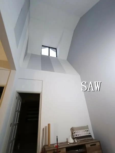 Room features: high ceiling, triangular ceiling design, white painted walls, grey accent wall, window with black frame, wooden furniture, light-colored flooring; style: modern.