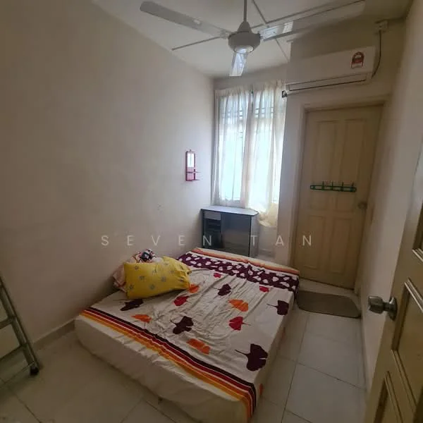 Bedroom features: single bed with floral bedding, ceiling fan, wall-mounted air conditioning unit, white painted walls, tile flooring, window with sheer curtains, wooden door, small study desk, decorative wall mirror, door mat; style: minimalist.