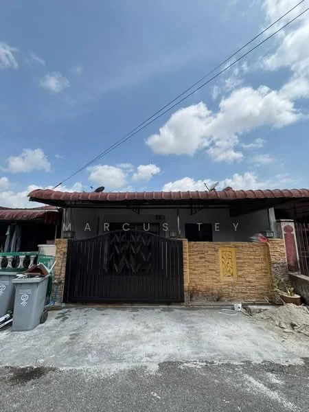 Exterior type: semi-detached house; features: black painted facade, brown tiled roof, stone cladding on lower half, metal gate, driveway, surrounding greenery, visible sky, paved walkway; style: modern.