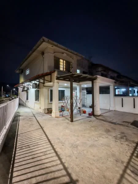 Exterior type: semi-detached house; features: white painted facade, flat roof, two-storey structure, covered car porch, concrete flooring, metal awning, windows with grills, exterior lighting fixtures, fenced perimeter, manicured garden area; style: modern.