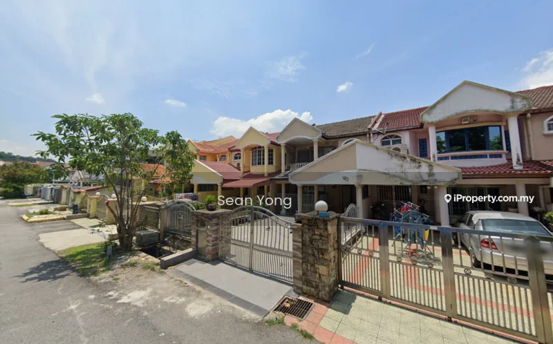 Exterior type: linked terrace house; features: two-storey linked terrace houses, red tiled roof, cream painted facade, yellow painted facade, stone cladding at the base, front gate with metal fencing, paved driveway, manicured lawn, surrounded by residential street, visible parked cars; style: modern.