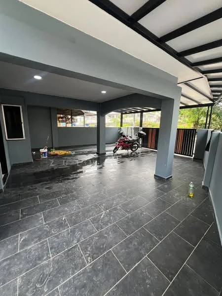 Room features: grey painted walls, black tile flooring, exposed ceiling beams, recessed LED downlights, large windows, open space layout, motorcycle parked, cleaning supplies visible; style: modern; view: garden.