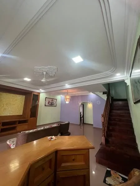 Living features: cream painted walls, light purple accent wall, polished floor tiles, 5-blade ceiling fan with light, recessed downlights, chandelier, wooden staircase, wooden cabinetry, sofa with patterned upholstery, decorative wall art, open layout, natural light from staircase area; style: modern.