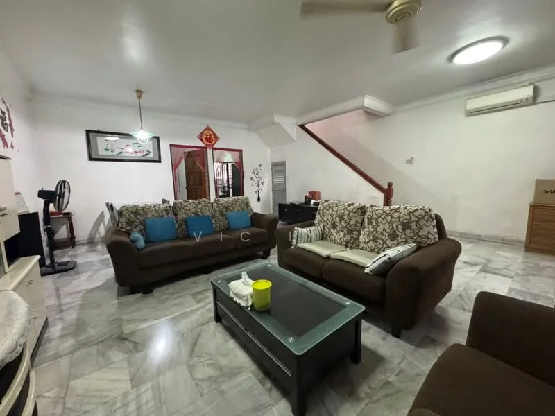 Living features: 2 brown fabric sofas with patterned cushions, coffee table with glass top, marble flooring, ceiling fan, wall-mounted air conditioning unit, decorative wall art, white painted walls, staircase in background, black console table, floor fan; style: contemporary.