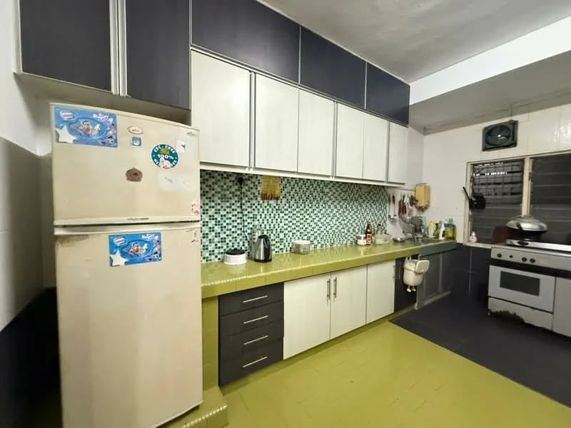 Kitchen features: white and grey cabinetry, green mosaic tile backsplash, green countertop, stainless-steel sink, chrome faucet, freestanding fridge, built-in oven, gas range, exhaust hood, wall-mounted storage, tile flooring, window with grill, kettle, bottle of cooking oil; style: modern.