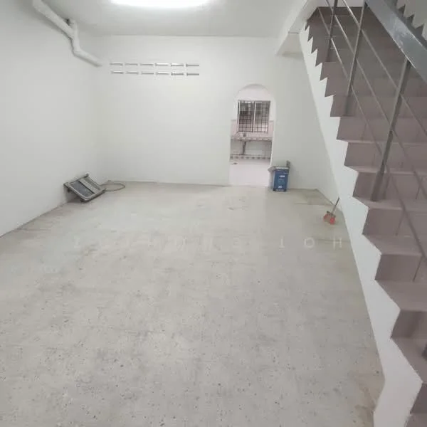 Room features: white painted walls, concrete flooring, staircase with metal railing, arched doorway, exposed ductwork, window with security bars, light fixture on ceiling; style: minimalist.