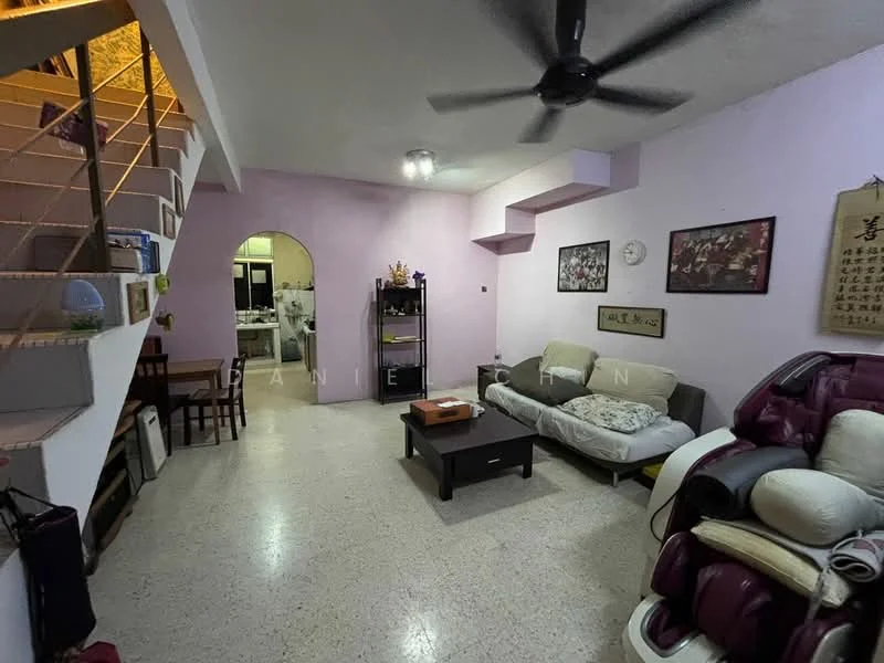 Living features: light purple painted walls, polished concrete flooring, 5-blade ceiling fan, sofa with light grey upholstery, coffee table, wall-mounted artwork, decorative wall clock, dining table with chairs, staircase leading to upper level, recliner chair, arched doorway leading to kitchen; style: modern.
