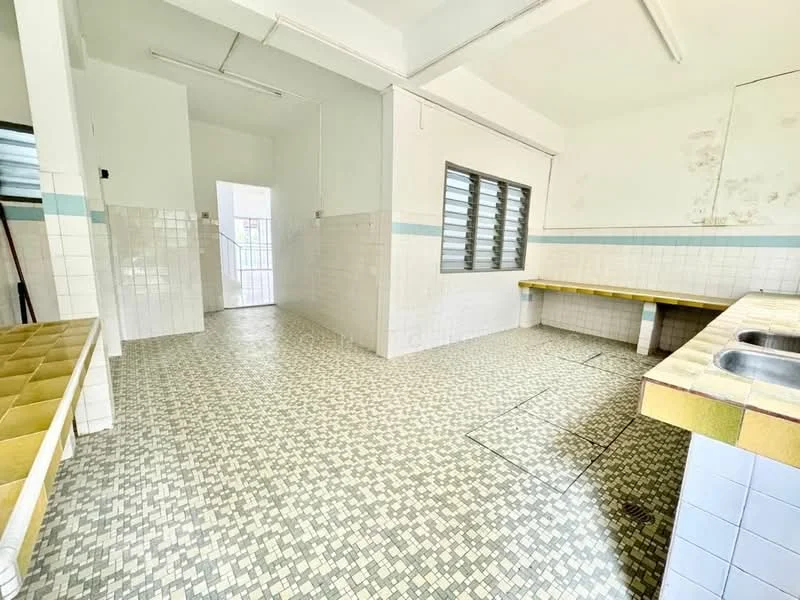 Laundry features: white tiled walls, yellow tiled countertop, mosaic tile flooring, double-bowl stainless-steel sink, window with horizontal bars, open layout, doorway leading to exterior, no visible appliances.