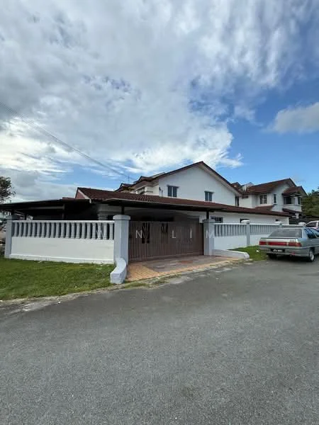 Exterior type: detached bungalow; features: white painted facade, pitched tile roof, manicured lawn, stone-paved walkway, gated entrance, double-volume main lobby, surrounded by mature greenery; style: modern.