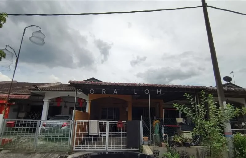 Exterior type: linked terrace house; features: red brick facade, pitched tile roof, single-storey, manicured lawn, fenced front yard, outdoor lighting fixtures, car parked in driveway, potted plants, gated entry; style: traditional.