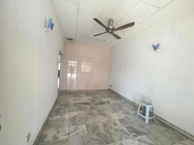 Room features: white painted walls, grey tiled flooring, 5-blade ceiling fan, two wall sconces, large empty space, no visible furniture, textured wall panel, high ceiling; style: minimalist.