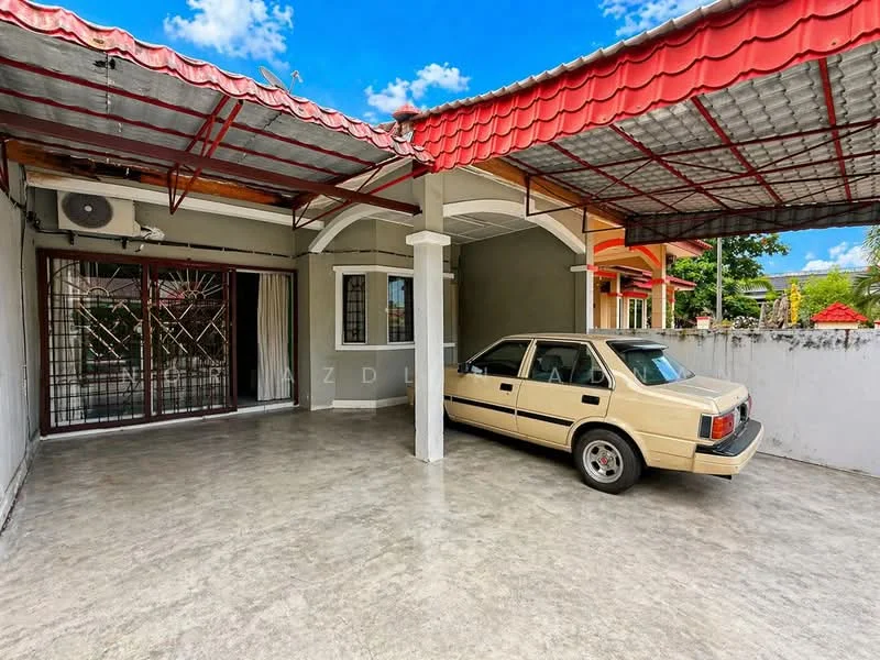 Exterior type: semi-detached house; features: red tiled roof, concrete driveway, car porch, grilled security gate, white painted walls, exposed concrete flooring, decorative columns, air conditioning unit, windows with grills, surrounding wall; style: modern.