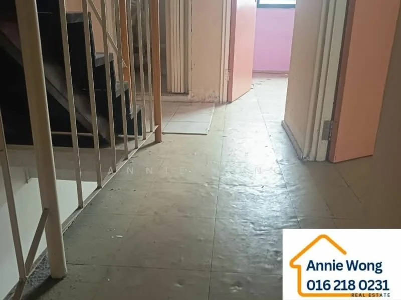Room features: tile flooring, staircase with railing, pink painted walls, doorway leading to another room, doorway leading to staircase, natural light from window, neutral color scheme.