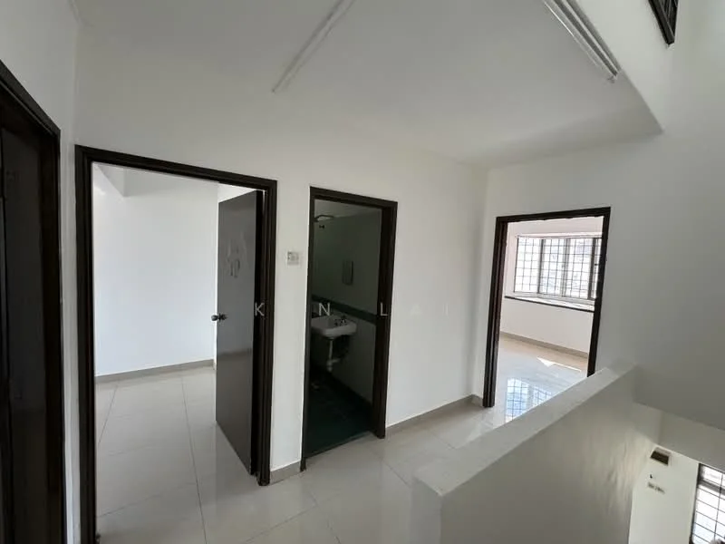 Room features: white painted walls, tile flooring, door with handle, window with grid, light fixtures on ceiling, doorway leading to bathroom, doorway leading to another room, corner of room with railing.