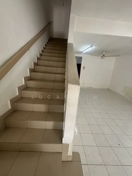 Room features: staircase with tiled steps, white painted walls, ceiling with fluorescent lighting, tile flooring, open space layout.