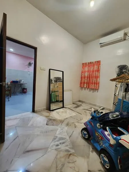 Room features: marble flooring, white painted walls, air conditioning unit, mirror, curtains with floral pattern, children's toy car, clothes rack, open doorway to adjacent room.