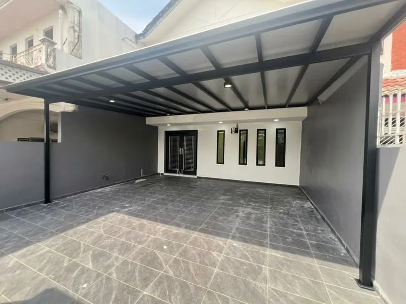 Exterior type: linked terrace house; features: covered car porch with metal roof, grey painted walls, black steel beams, slate tile flooring, vertical windows, outdoor lighting, manicured landscaping, open layout, contemporary design; style: modern.