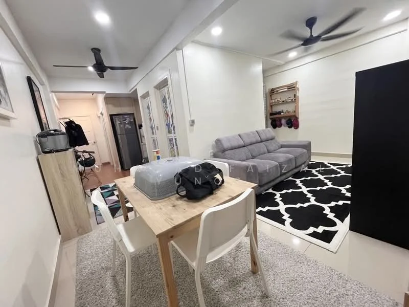 Living features: 3-seater fabric sofa in grey, 2-seater fabric sofa in purple, black and white area rug with geometric pattern, wooden dining table, 4 white dining chairs, ceiling fan, wall-mounted shelves, recessed downlights, light-coloured walls, tile flooring; style: modern. Room features: doorway leading to hallway, refrigerator visible in hallway.