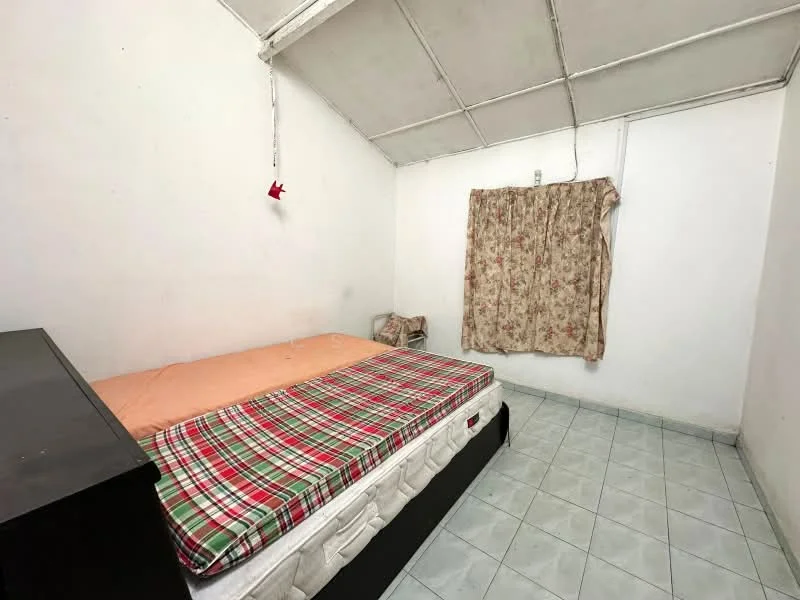 Bedroom features: single bed with mattress and plaid bedspread, white painted walls, slanted ceiling, curtains with floral pattern, tiled flooring in light color, black bedside table.