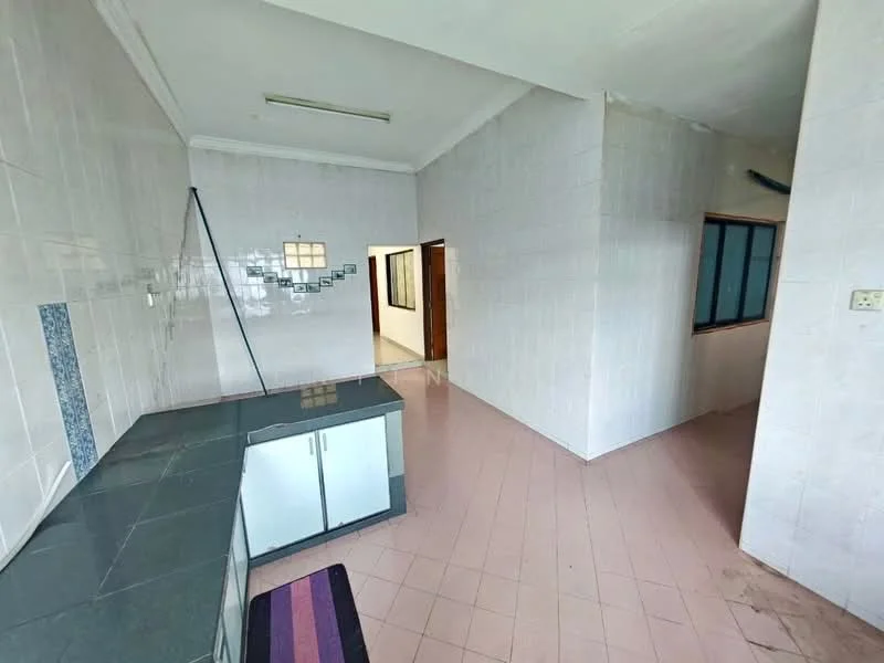 Kitchen features: grey granite countertop, white cabinetry, tile backsplash, pink tiled flooring, wall-mounted shelving, single-bowl stainless-steel sink, window with glass panes, light fixture on ceiling. Room features: pink tiled flooring, white painted walls, doorway leading to another room, window with glass panes.
