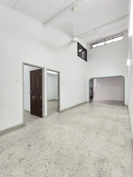 Room features: white painted walls, polished concrete flooring, ceiling fan, large windows, doorway leading to another room, doorway leading to an archway, high ceiling, natural light from windows; style: minimalist.
