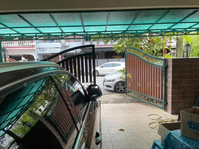 Exterior type: linked terrace house; features: double-volume car porch, sliding gate, paved driveway, green canopy roof, mature trees, brick wall, outdoor lighting, surrounding residential area; style: modern.