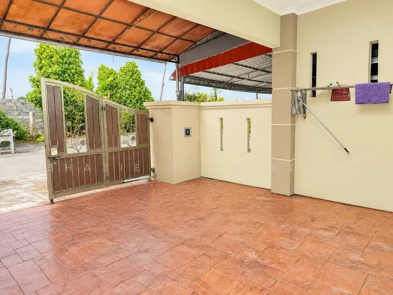 Exterior features: gated entrance, stamped concrete flooring, open-air car porch, decorative wall with vertical slits, overhead roof, manicured greenery, outdoor space, clothesline, wall-mounted hooks; style: modern.