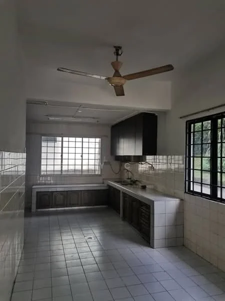 Kitchen features: white tiled walls, grey tiled flooring, black cabinetry, white countertop, single-bowl stainless-steel sink, chrome faucet, ceiling fan, large window with black grille, under-cabinet lighting, wooden lower cabinets, open shelving, wall-mounted storage, no visible appliances; view: garden.