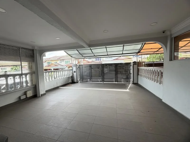 Room features: grey tiled flooring, white painted walls, ceiling with recessed lighting, large glass sliding door, awnings for shade, railing with decorative balustrade, open space layout, natural light from windows; style: modern; view: street.