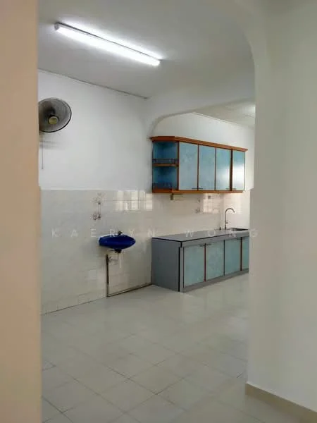 Kitchen features: white tiled walls, light grey floor tiles, blue cabinetry with wooden trim, single-bowl stainless-steel sink, chrome pull-down faucet, wall-mounted exhaust fan, countertop with storage below, open shelving above the countertop.