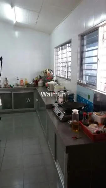 Kitchen features: white painted walls, grey tiled flooring, stainless-steel sink, chrome pull-down faucet, kitchen countertop with storage cabinets, built-in gas stove, wall-mounted cabinets, window with metal grilles, open shelving, various kitchen appliances, multiple containers and utensils on countertop.
