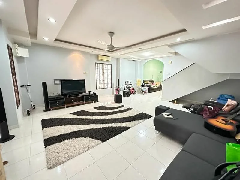 Living features: white painted walls, recessed ceiling with downlights, 5-blade ceiling fan, large window with grid design, white tiled flooring, black sectional sofa, area rug with striped pattern, TV console with flat-screen TV, decorative wall art, guitar on sofa, open staircase, green accent wall in adjacent room; style: modern.